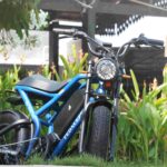 Ranger Retro electric moped riding on city roads Ranger Retro electric moped by Pedaleze